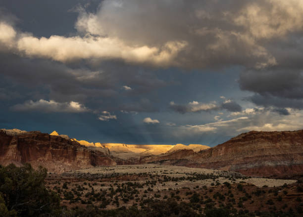 istock Rays Rise Up to Clouds in Sunset Sky 1427374152