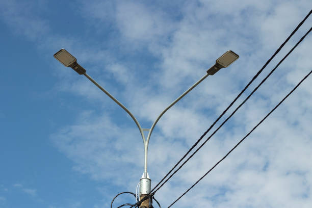 istock Street light during day. Pole with lamp. Urban electricity. 1427384267