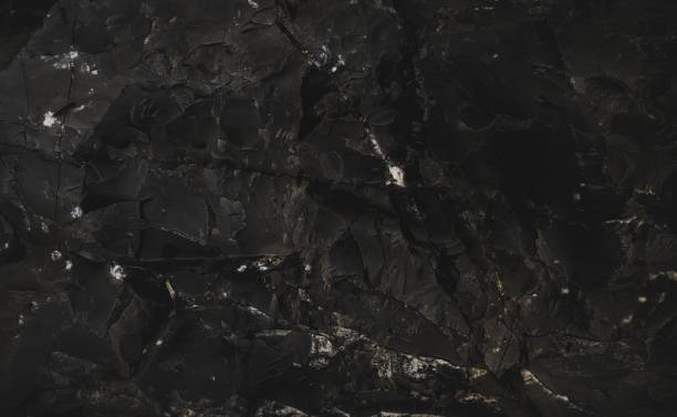 istock Dark marble. Black texture. Stone background. Rock texture. Rock surface with cracks. Rock pile. Paint spots wall. Grunge Rough structure. Abstract texture. 1427385520