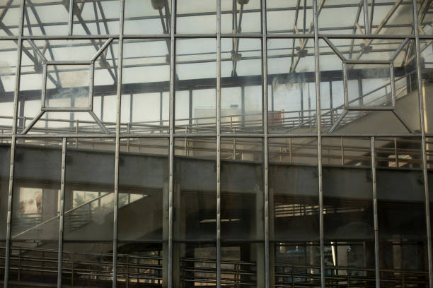 istock Glass pedestrian crossing building. Bridge over road. Interchange. Details of technical structure. 1427385693