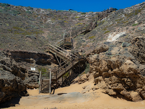 Steep timber steps up from beach