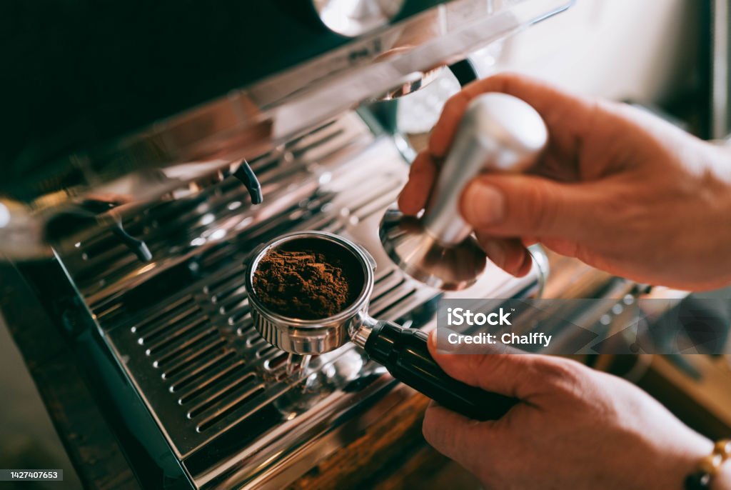 Preparing an espresso at home Espresso Stock Photo