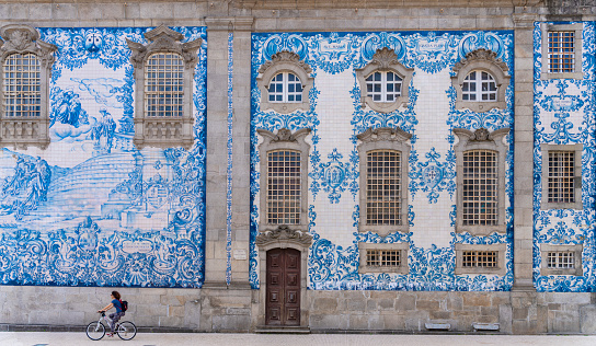 Wall of the Carmo church decorated with hand painted tiles from the 19th century in Oporto, Portugal