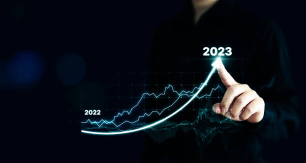 istock Businessman pointing arrow graph corporate future growth plan. Business development to success and growing growth year 2022 to 2023 concept 1427425505