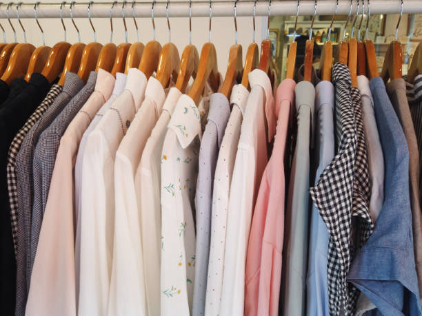istock close up of stack of clothes hanging 1427431176