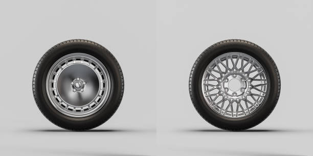 istock Car wheels on white background. Isolated car tires with shiny rim from front view. 3d rendering 1427433101