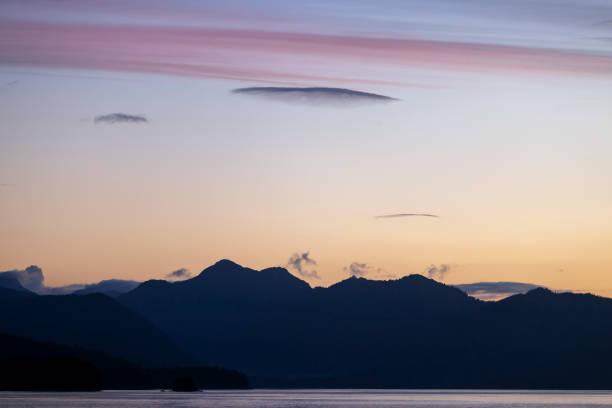 landscape of mountain, island in sea with amazing sunset with dramatic color sky