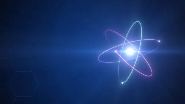 Photo of Unstable Atom nucleus with electrons spinning around it technology background