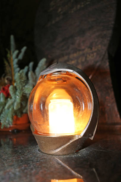 istock Lighting candles for the dead on All Saints Day 1427465761