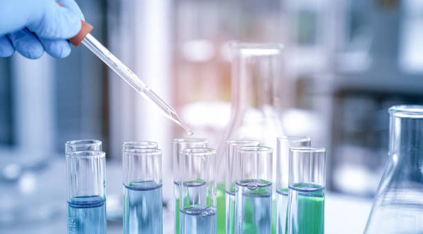 istock Test tubes with lab glassware, science laboratory research and development concept 1427473205