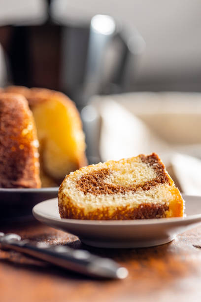 istock Sweet sponge cake. Bundt cake on wooden table. 1427473258