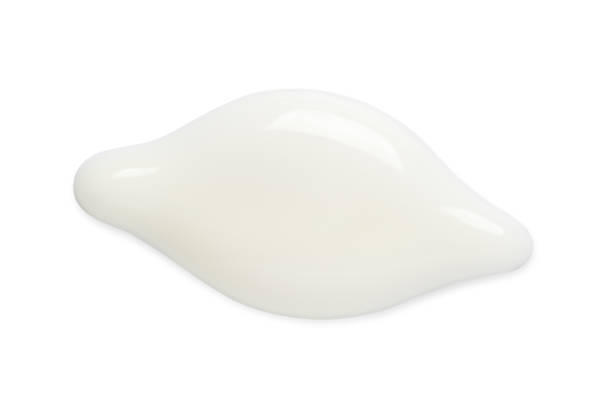 istock A sample of white cosmetic moisturizer. Isolated on a white background. Macrophotography 1427477616