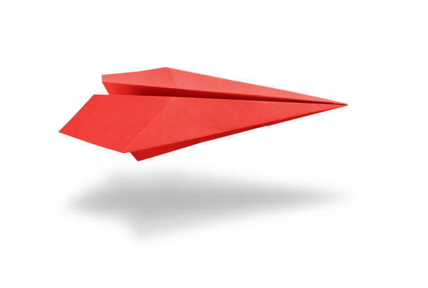 Red paper plane origami isolated on a blank white background