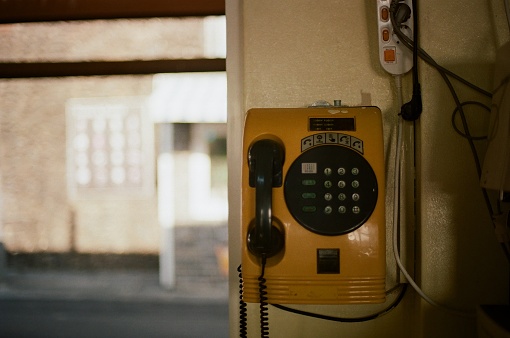 a telephone box in an old store