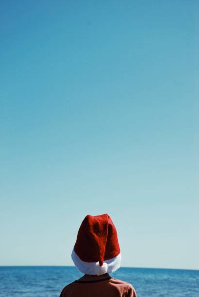 istock Child in Santa Hat - Waiting for Christmas Concept 1427482605