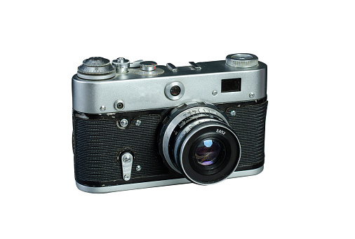 Vintage camera on a white background. Old camera. Isolated image. Phototechnics.