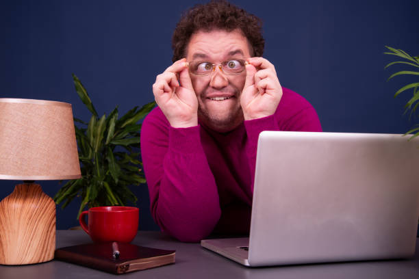 istock Funny businessman is working in the office. 1427485887
