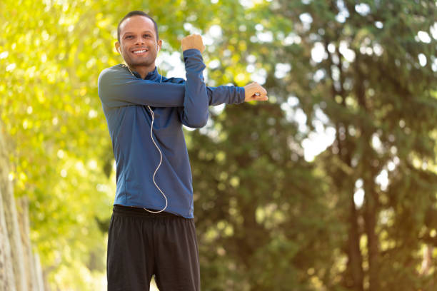 istock Young multiracial man works out at the park 1427490612