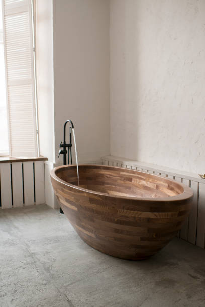 istock Bathroom interior with wooden bathtub 1427492249