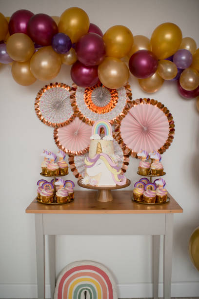 istock A cake on the table in a room decorated for the holiday 1427493055
