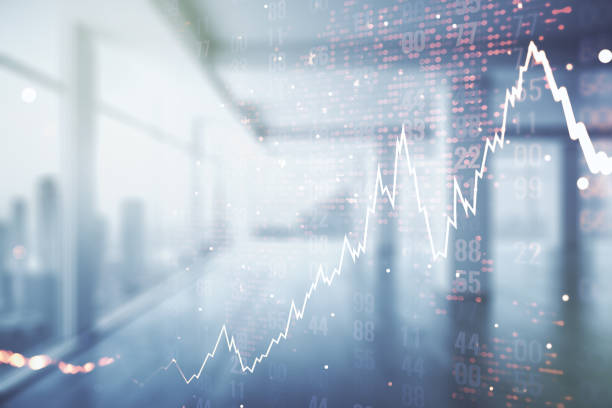 istock Double exposure of abstract creative financial chart hologram and world map on empty modern office background, research and strategy concept 1427495422