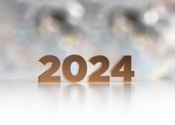 istock A golden 2024 text is standing on the white desk 1427495895