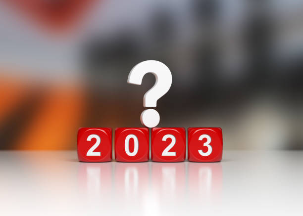 New year concept red colored cubes question mark and 2023 text stock photo