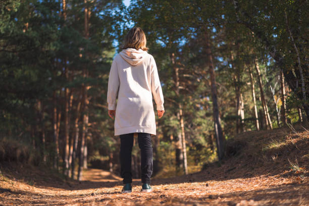 istock young woman in a pine forest 1427506092