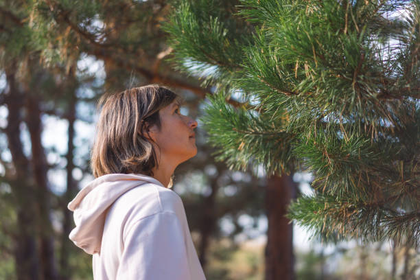 istock young woman in a pine forest 1427508892