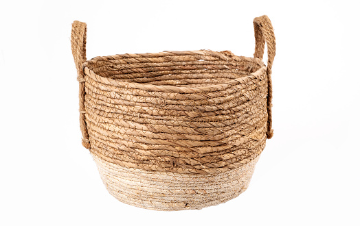 vintage weave wicker basket with handles isolated on white background