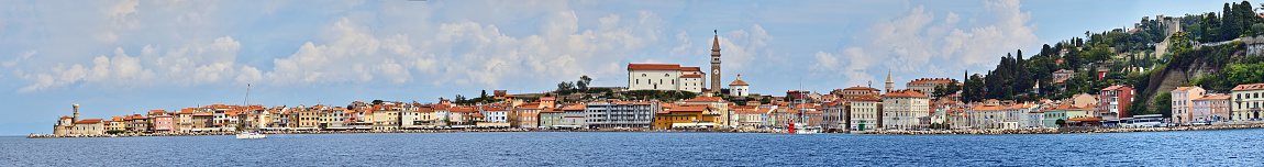 Piran, Slovenia - August 28, 2022: Piran is a resort town on the Slovenian Adriatic coast, known for its long pier and Venetian architecture.