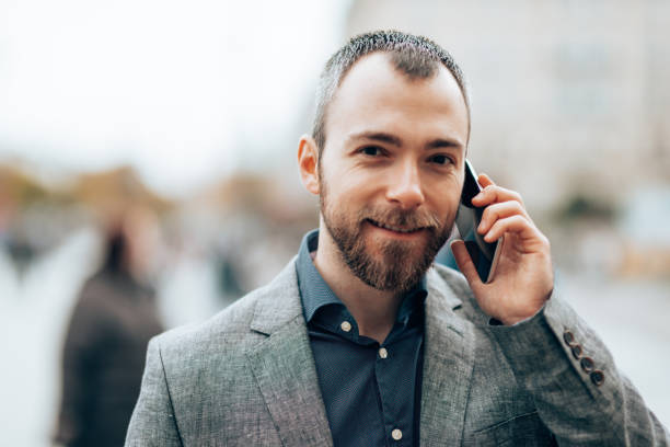 istock business man on the phone in berlin 1427518903