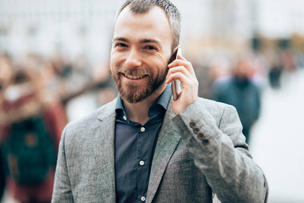 istock business man on the phone in berlin 1427519175