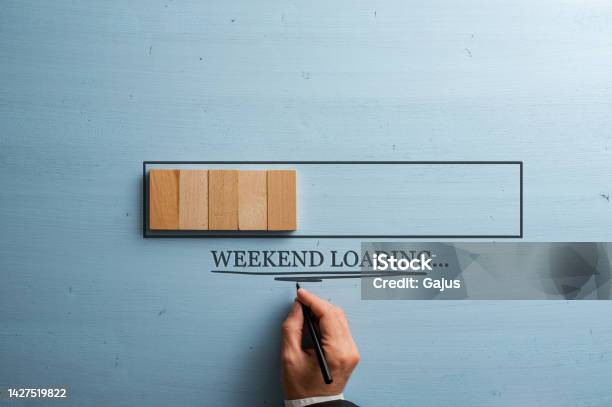 Weekend Hand Sign Male Hand Writing A Weekend Loading Sign Under A Loading Bar Stock ...