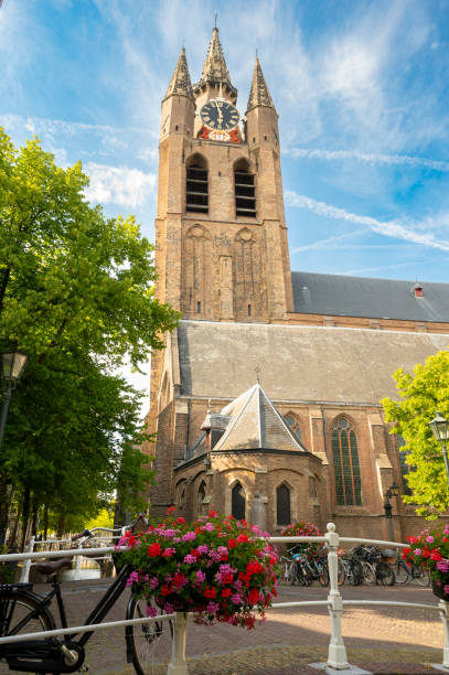 istock Old Church, Oude Kerk in Delft during a summer day 1427520429