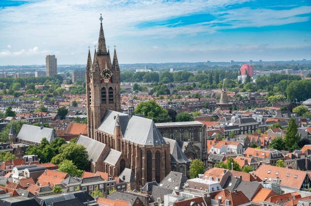 istock Old Church, Oude Kerk in Delft during a summer day 1427521554