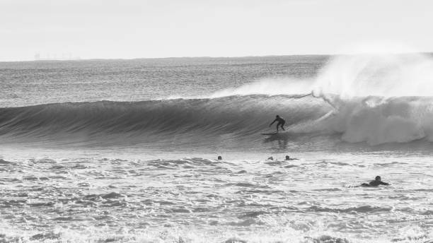 istock Surfer Wave Ride Surfing Black White 1427523501
