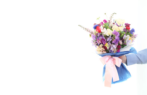 Easter scene with fresh tulips and hyacinth flowers blue and pink bouquet isolated over white background