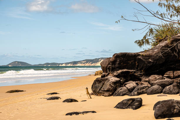 istock Beach with view and rocks on the side 1427530047