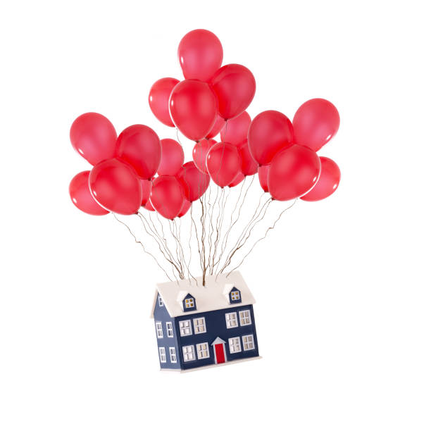 Moving house concept with balloons isolated stock photo