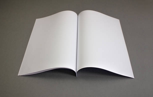istock Open book, magazine or catalog on a black background. A4 format template. 1427533896