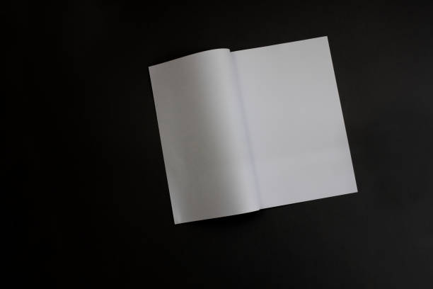 istock White magazine or catalog template on a black background. 1427533911