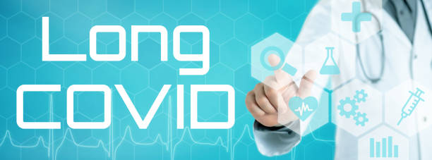 istock Doctor touching an icon on a futuristic interface - Long COVID 1427534630