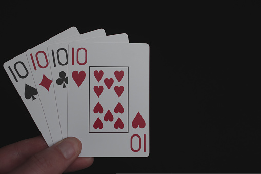 Dice and poker cards on white background