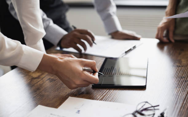 istock Business people working together in office and planning new project 1427540596