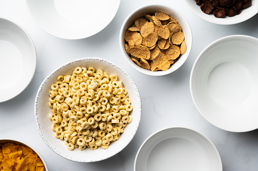 Cereals for breakfast over white marble table