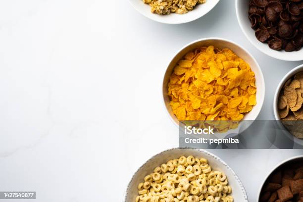 Cereals For Breakfast Over White Marble Table Stock Photo - Download Image Now - Above, Backgrounds, Berry