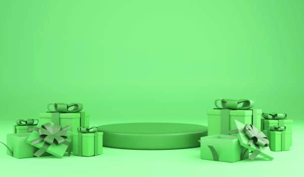 istock 3D rendering Christmas presents and green podium on green background, 3d illustration Christmas green monochrome 1427541489