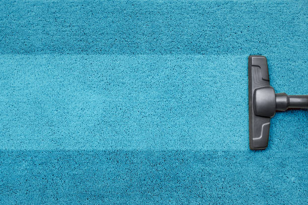 vacuum cleaner on the blue carpet floor - photography carpet floor high angle view imagens e fotografias de stock