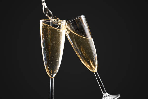 istock Glasses of champagne with splash 1427551405